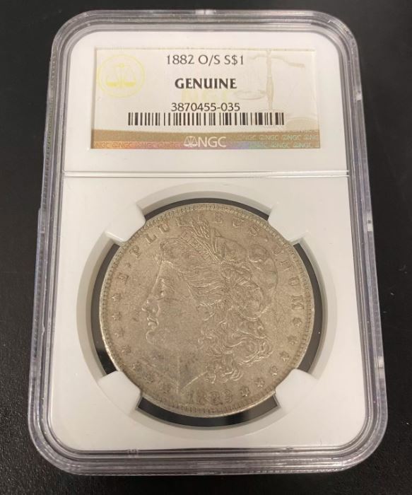 1882 O/S Morgan Dollar NGC Genuine Silver $1