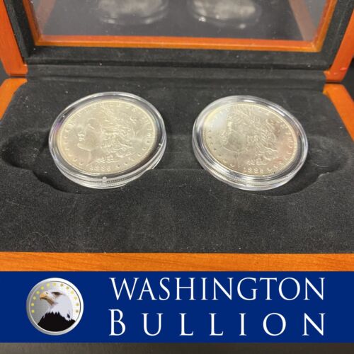 1885-O & 1885 BU Morgan Silver Dollars In Display Case