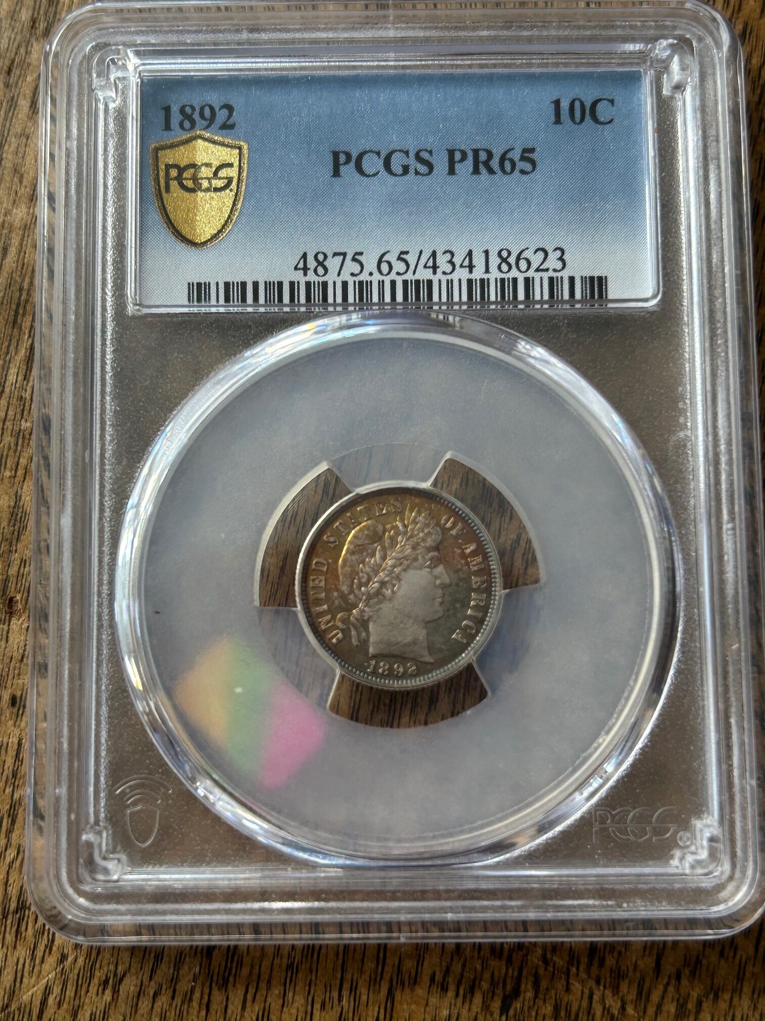 1892 Barber Dime. Proof-65 (PCGS).  toned